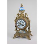 A French gilt metal and enamel mantel clock with 8cm blue and white enamel dial, plaque and vase