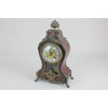 A late 19th century French Boulle mantel clock with 10cm dial, blue and white enamel cartouche Roman