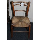 A 19th century beech rush seat dolls / childs chair (a/f)