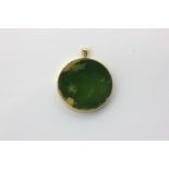 A 'flower' jade pendant in plain mount and bole