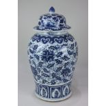 A Chinese blue and white porcelain ginger jar and cover of baluster form, decorated with flowers,
