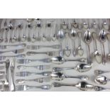 A George III and Victorian silver eighty-one piece part canteen of fiddle and shell pattern cutlery,