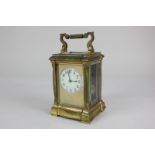 A 19th century French repeater carriage clock by Henri Jacot, with gilt mask and circular