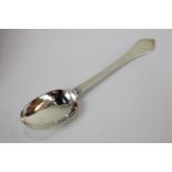A William III Britannia standard silver trifid spoon with initialled handle and beaded rattail bowl,