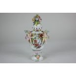 A Sitzendorf porcelain pot pourri vase and cover, of baluster form, floral encrusted and decorated