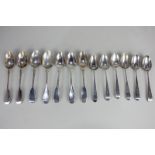 A set of six William IV silver Old English pattern teaspoons with floral engraved handles and
