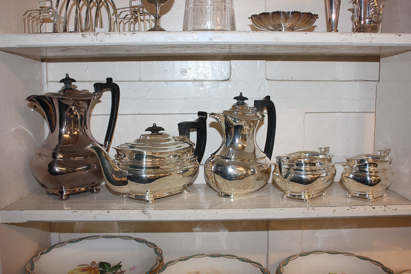 A Mappin & Webb four piece silver plated tea set of teapot, hot water jug, sugar bowl and cream jug,