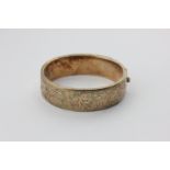 A silver gilt hinged bangle, 26.5g