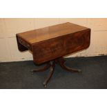 A 19th century mahogany Pembroke table with drawer and opposing dummy drawer, on turned baluster