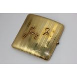 Horse racing Interest, an 18ct gold cigarette case, engine turned, with cabochon thumb piece applied