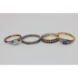 Three gem set rings, and a marcasite ring