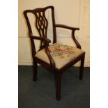 A Chippendale style mahogany carver dining chair with vase shaped pierced back splat and tapestry