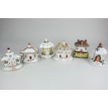 Five various Staffordshire pottery models of cottages, most pastille burners, tallest 14cm, together