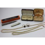 Three items of imitation pearl jewellery, two rings, gilt bar brooch, penknife and a propelling