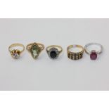 Five various gem set rings in 18ct and 9ct gold