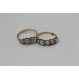 An opal three stone ring, a four bead pearl ring