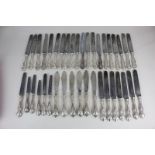 An Elkington & Co set of twenty-eight silver plated dinner knives, 5 dessert knives, and 6 fish