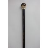 A tiger's eye and gilt mounted ebony walking stick, 96cm