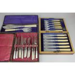 A cased set of six silver plated and mother of pearl handled dessert knives and forks, a cased set