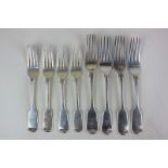 A mixed set of eight Victorian silver fiddle pattern forks, four table and four dessert, London 1839