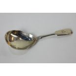 A Victorian silver caddy spoon with pear shaped bowl, fiddle pattern handle with engraved