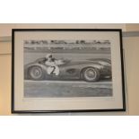 Motor racing interest, a framed black and white reproduction photograph of Sterling Moss in sports