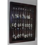 A collection of twenty-six silver and other metal commemorative teaspoons including a Portsmouth