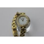 A lady's Longines 18ct gold and diamond bracelet watch with mother of pearl dial and gem set