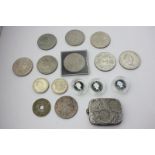 A collection of commemorative and other coins, and a coin case