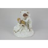 A Victorian Royal Worcester porcelain figure group bud vase, after a model by James Hadley, of a boy