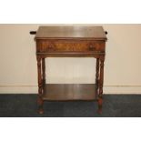 A Maple & Co Ltd oak rectangular side table the single drawer above turned legs with undershelf 63.