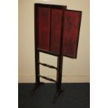 A mahogany framed fire screen with two sliding panels, 91cm high