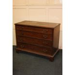 A small mahogany chest of four graduated drawers with brass drop handles, on bracket feet, 98cm