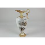 A Royal Worcester porcelain ewer with reticulated spout, decorated with birds amongst branches and