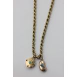 A 9ct gold rope twist neck chain hung with two turquoise set pendants