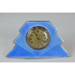 An Art Deco silver and blue enamel eight day Swiss clock, maker Barker Brothers Silver Ltd,