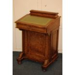 A Victorian walnut Davenport with banded borders, hinged stationery box above green leather inset