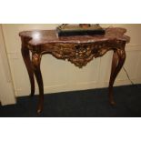 A Louis XVI style console table with marble top, on slender cabriole legs, 120cm