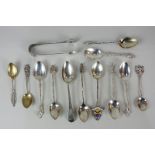 A collection of assorted silver tea and coffee spoons including a George III bright cut engraved