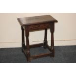 An oak joint stool with inlaid frieze, on turned supports (a/f)