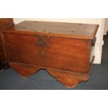 A Dutch chest on wheels, with rectangular studded lifting top and two cast iron handles, the moulded