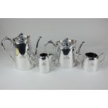 A Walker and Hall silver plated tea and coffee set comprising teapot, coffee pot, milk jug and sugar