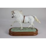 A Royal Worcester bisque porcelain model of a Welsh mountain pony, Coed Coch Planed, owned by Lord