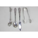 A Continental white metal christening set of knife and spoon, marked 830, an Italian 800 silver