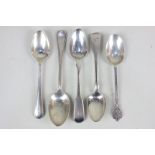 A pair of George III silver fiddle pattern teaspoons, London 1806, and three later various teaspoons