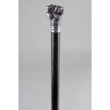 An Elizabeth II silver mounted figured ebony walking stick modelled as a fist holding a snake, maker