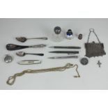 A Victorian silver and mother of pearl fruit knife, a silver purse, two silver lidded bottles, three