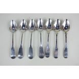 A set of three George IV silver fiddle pattern teaspoons, maker James Bell, Newcastle 1825, and a