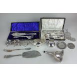 A silver plated wine funnel with filter, together with a Mappin & Webb salt, two cased sets and