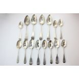 A set of four George III silver Old English pattern dessert spoons with engraved initials, two